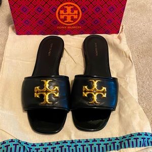 Tory Burch black slides! I bought an 8 in Women but I really needed 8.5.